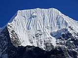 Rolwaling 05 07 Tsoboje (Chobutse) Icy Face From Sangma Kharka The icy face of Tsoboje (Chobutse, 6689m) rises directly above the Sangma Kharka. Tsoboje was climbed for the first time on April 24, 1972 by West Germans Wolfgang Weinzierl, Peter Vogler, Gustav Harder, and Klaus Harder.